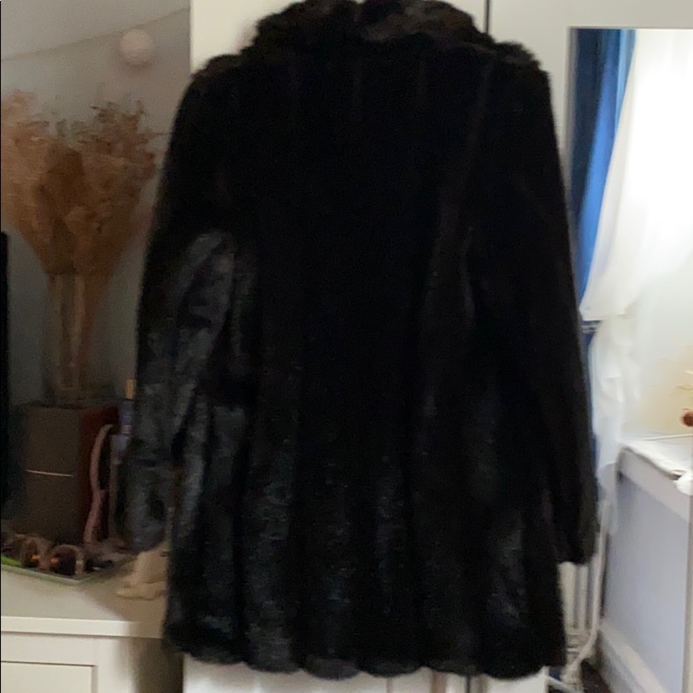 Fur like coat. Color dark brown. Size small